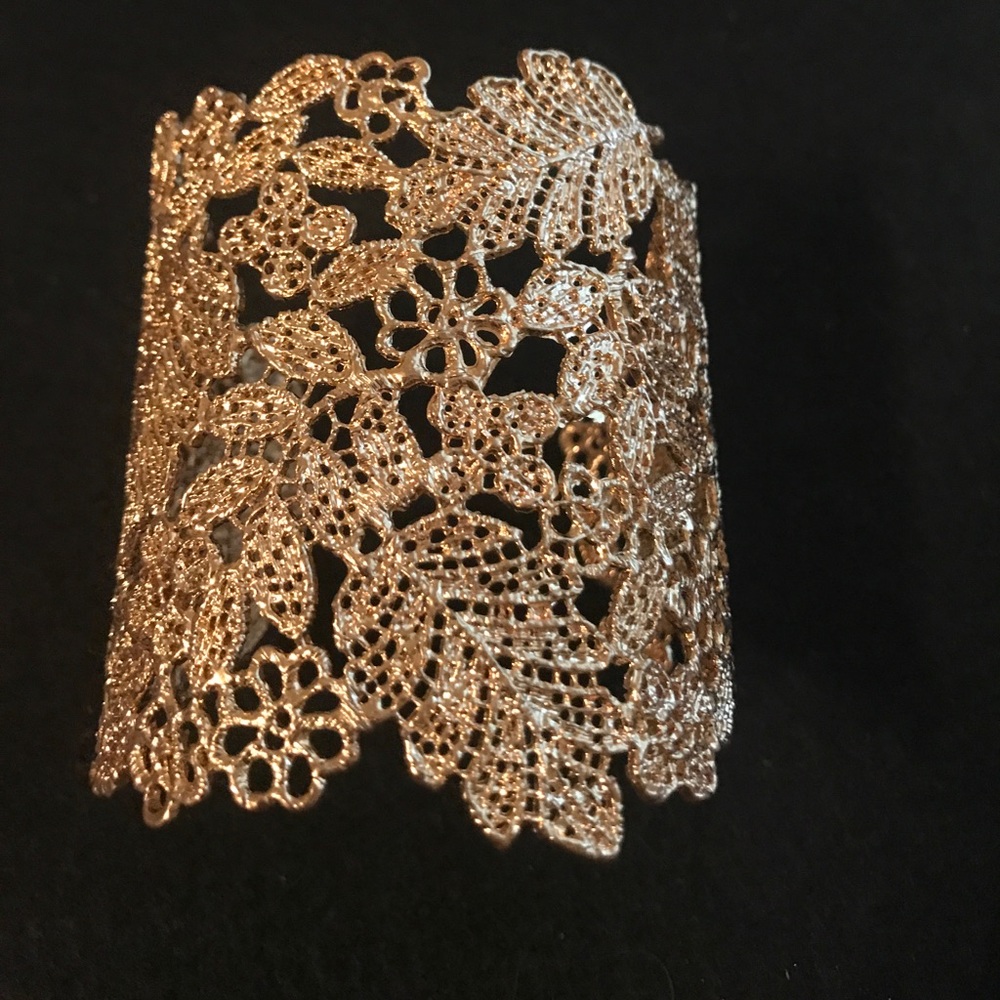 Gold tone floral cuff bracelet